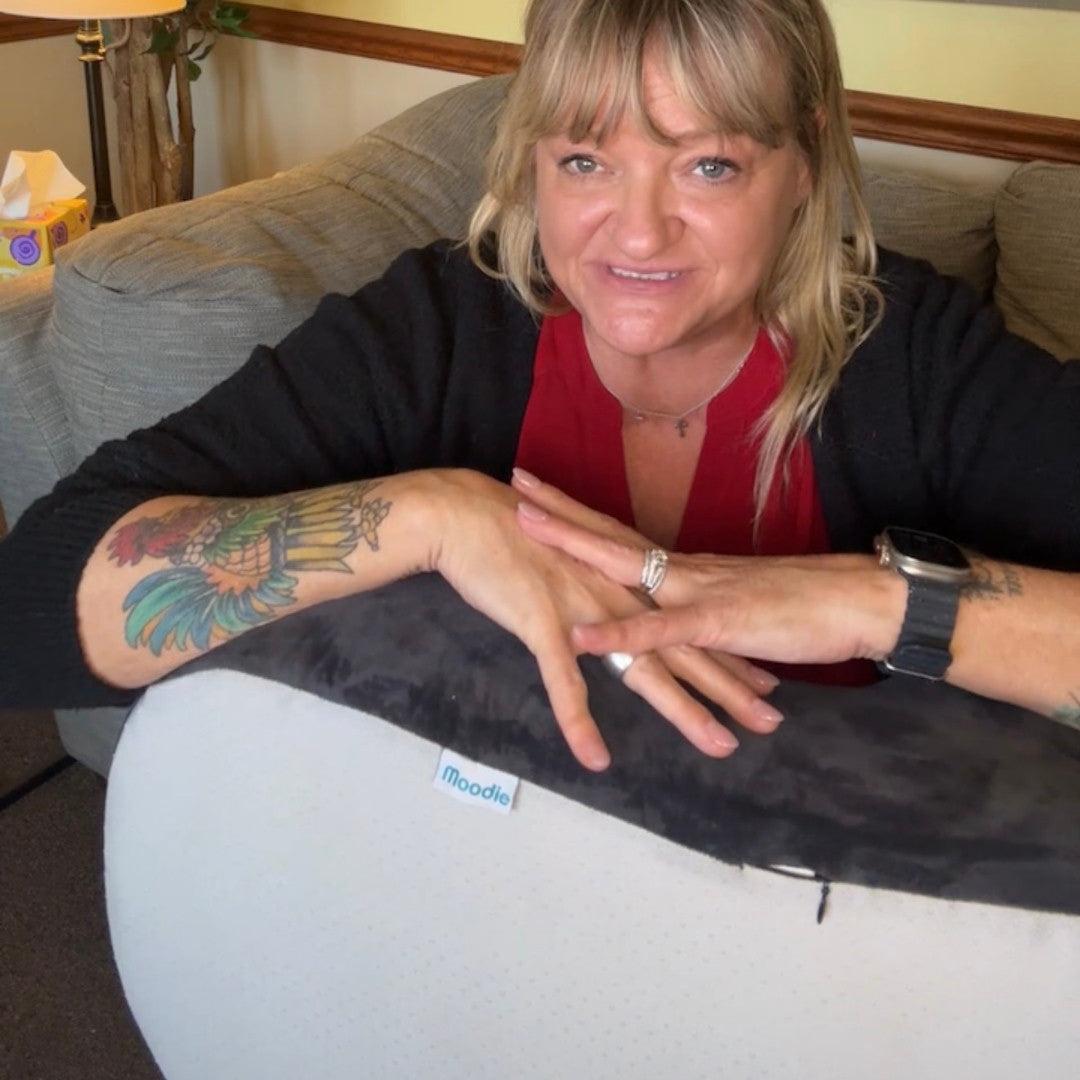 Moodie customer, 50s, with her Moodie Pillow