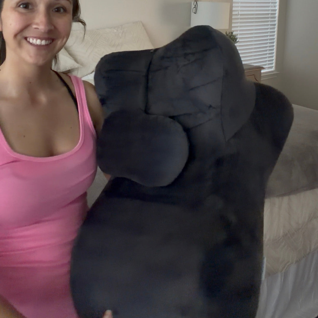 Moodie customer holding the Moodie Pillow